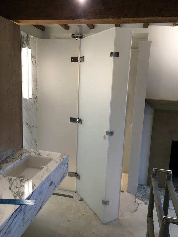 Bespoke frosted glass shower enclosure in Enfield luxury bathroom
